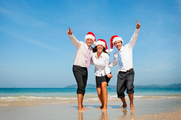 Fototapeta premium Business people are enjoying the beach