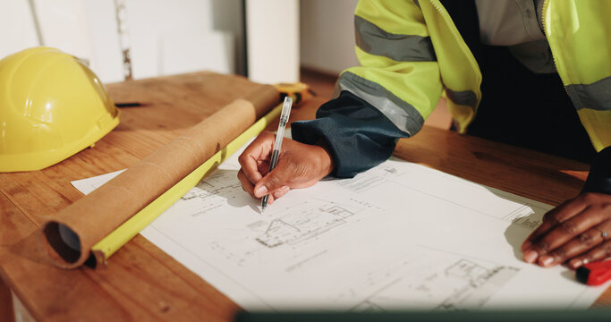 Construction, writing and hands of woman for blueprint, building design and planning for property. Architecture, desk and person with sketch, floorplan and drawing for layout, remodeling or structure