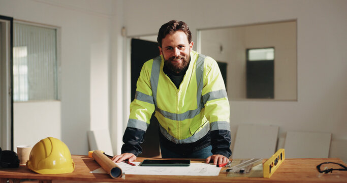 Engineer, happy and portrait with man and blueprint for property surveyor, architect or renovation. Layout, floor plan or building contractor with person on construction site for remodeling project