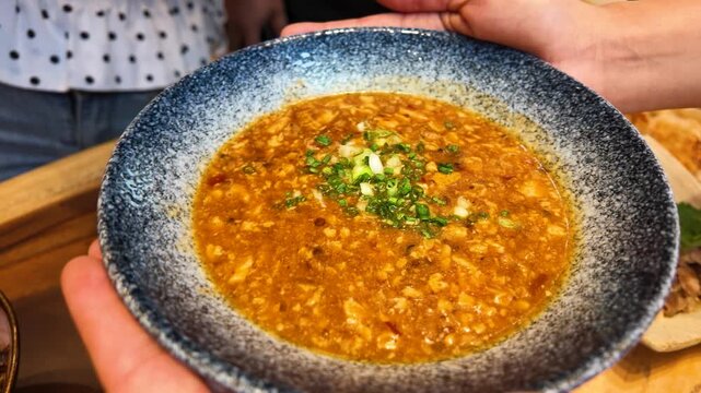 Spicy Mapo Tofu Stew Served in Blue Ceramic Bowl