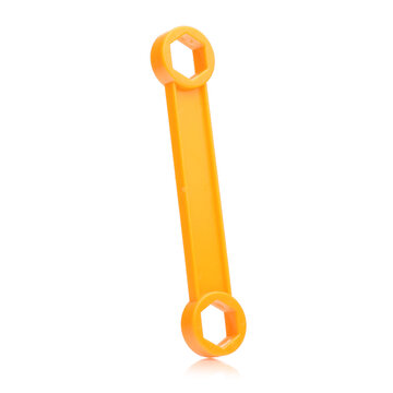 Orange plastic toy box spanner isolated on white background