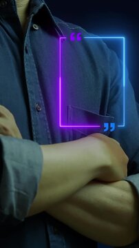 Businessman crossed arms vertical shot displaying glowing rectangular quote textbox frame mockup display. Business testimonial quote, statement frame, and leadership communication space concept.