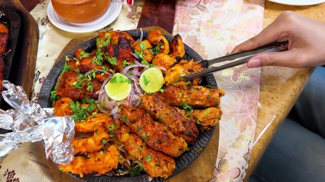 Indian Chicken Tikka and Tandoori Kebab Sizzler Platter in Bangkok