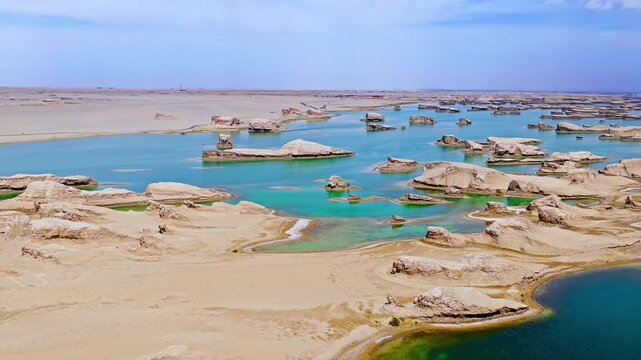 Aerial view of water yardang landforms in a turquoise lake in Qinghai, China