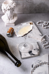 Handcrafted champagne or wine glass from oyster sea shell © Yulia Furman