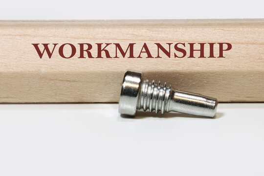 Workmanship concept with imperfect screw illustrating quality control