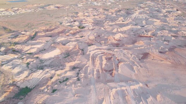 Opal Mining Piles, And Dirt Roads Of Coober Pedy In South Australia - High Angle Aerial Drone Shot