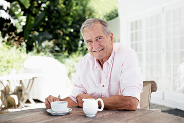 Senior, man and portrait with tea outdoor for morning fresh air, peaceful retirement and happy. Pensioner, elderly person and start day in home backyard with beverage, calm me time and wellness