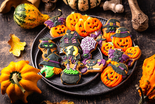 Halloween cookies in shape of pumpkin jack-o-lantern