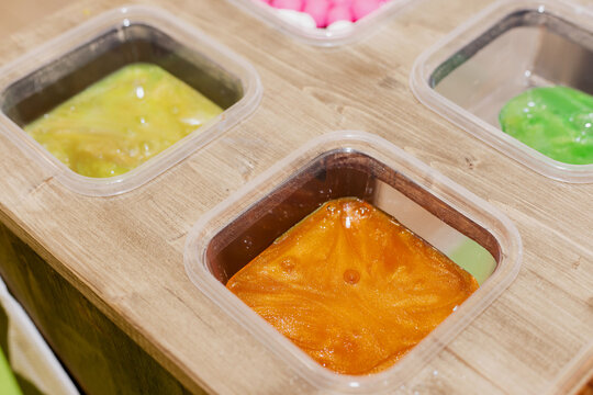 Close-Up of Elastic Glittering Therapeutic Putty Substance Demonstrating Viscosity and Sensory Play Development for Kids