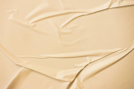 Yellow blank crumpled and creased paper poster texture background