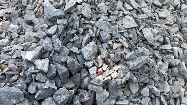 Top view crushed gravel stones texture background construction material