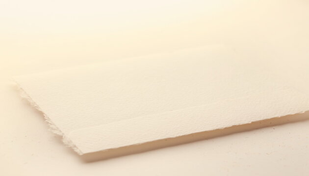 White blank paper sheet on warm background 温かみのある光と影が差し込むシンプルな白いペーパーシートのプレゼン背景