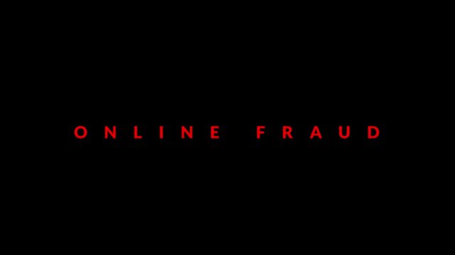 Online fraud warning text features glowing red letters set against a plain black background.