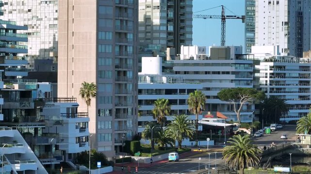 Punta del Este buildings telephoto view over the Playa Mansa waterfront and marina on a clear day