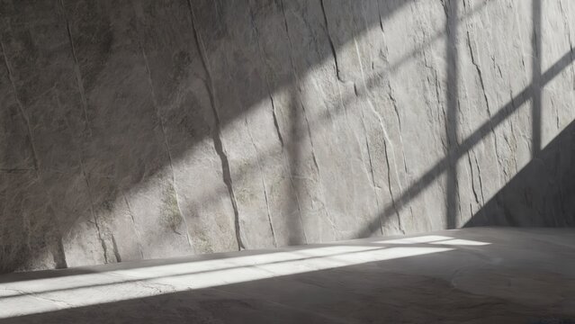 Textured concrete wall with dramatic sunlight shadows