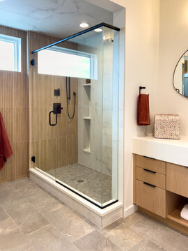 Walk in shower with glass enclosure