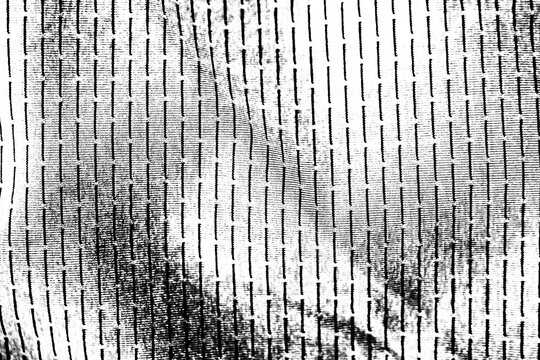 Heavy fabric texture. Grunge background. Abstract halftone illustration. Overlay for an interesting effect and depth. Black, isolated on a white background.