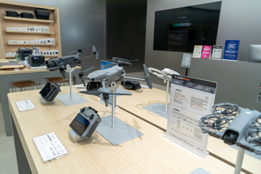 DJI Air 3S, Mavic 4 Pro and Neo 2 drones on display at DJI store
