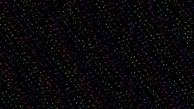 Seamless Looping Diagonal Rain of Multicolored Glowing Chromatic Light Particles on Black Background
