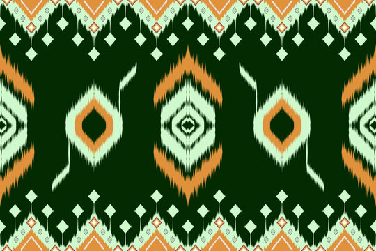 Illustration of abstract geometric seamless ikat pattern on dark green background.