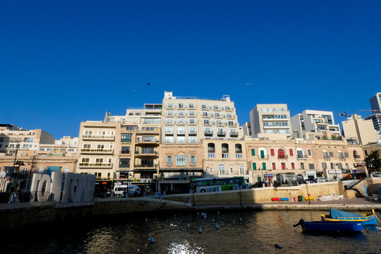 Spinola bay st julian's waterfront with love monument