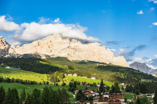 Sunlit alpine village in the Italian Dolomites