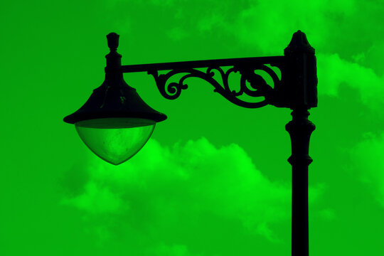 Malta street lamps silhouetted against blue hour sky