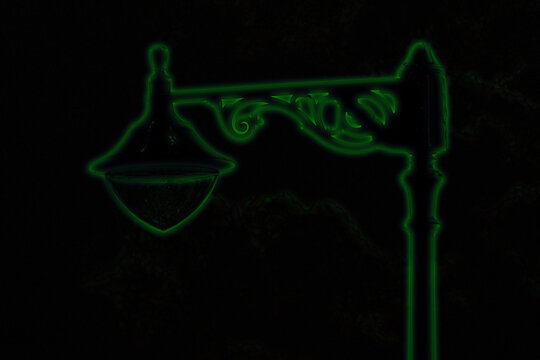 Malta street lamps silhouetted against blue hour sky
