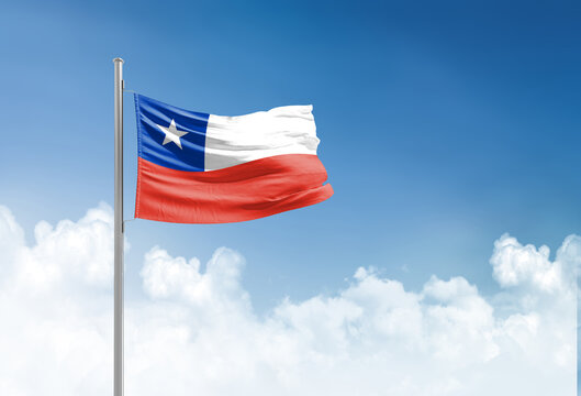 Chile flag waving in beautiful sky.