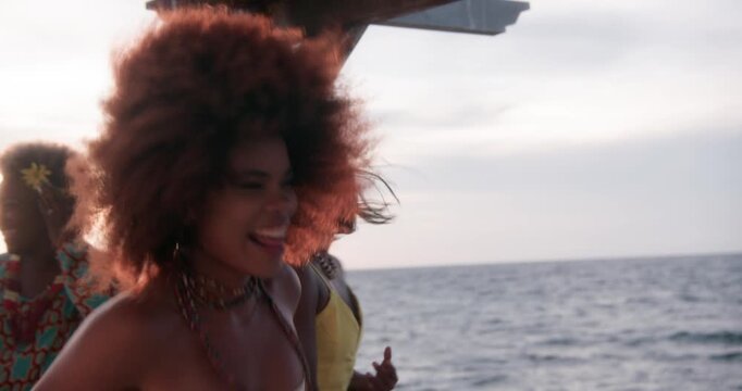 Girls dancing modern attractively on a pier in Cartagena, Colombia