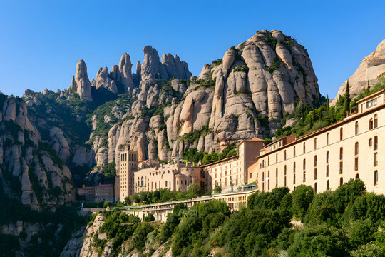 Montserrat Monastery sits on the Mount Montserrat, in Catalonia, Barcelona, Spain. On a sunny day with blue skies