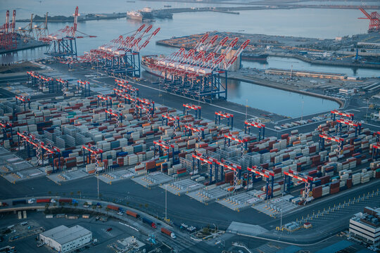 Aerial view of container cranes and shipping containers