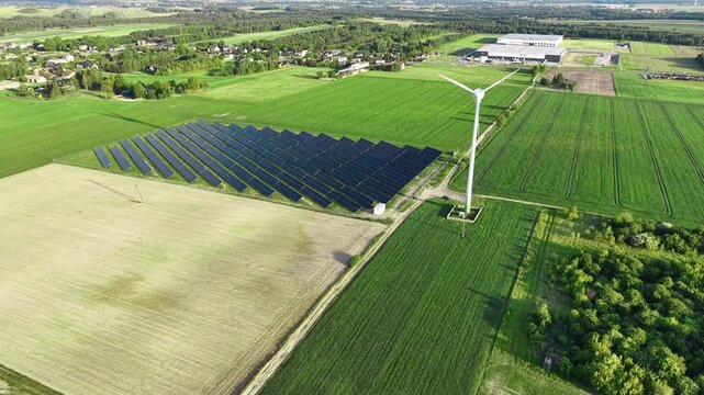 Wind turbine and photovoltaic panels aerial top view