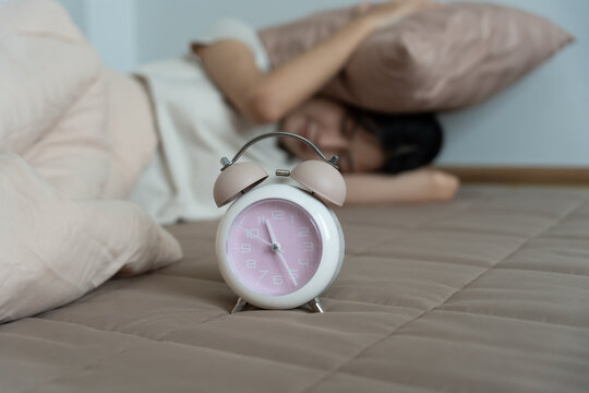 Asia young woman sleep late, lady is late appointment or work or class study, overslept, difficulty get up in mornings, time worried, not on time, sleepy, over due, over due