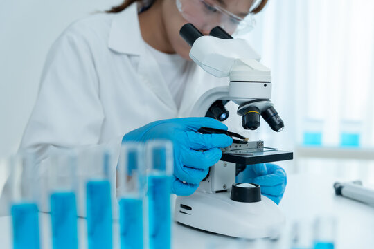 Scientist check chemical whole grains residues in laboratory. Control experts inspect the concentration of chemical residues. hazards, standard, prohibited substances, contaminate, Microbiologist