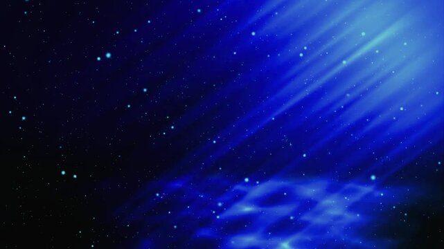 Ethereal blue light beams cascading through a dark starry abyss in this digital motion video clip showcasing shimmering particles drifting slowly in a tranquil atmosphere to create a dreamy magical vi