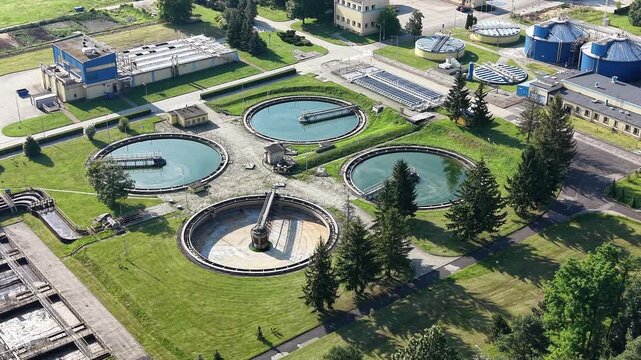 Water management infrastructure with treatment tanks and utility buildings