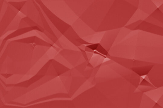 Abstract background featuring a textured surface of crumpled red paper with soft shadows and highlights