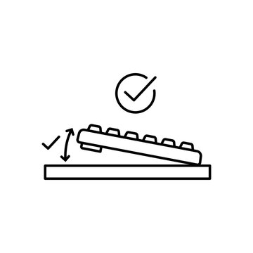 Line art illustration of a computer keyboard with an adjustable tilt angle and checkmark indicator.