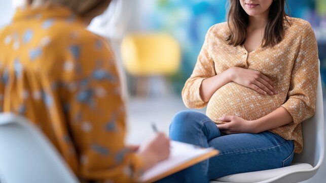 A pregnant woman in a casual setting is being gently supported by a professional during a consultation or counseling session.