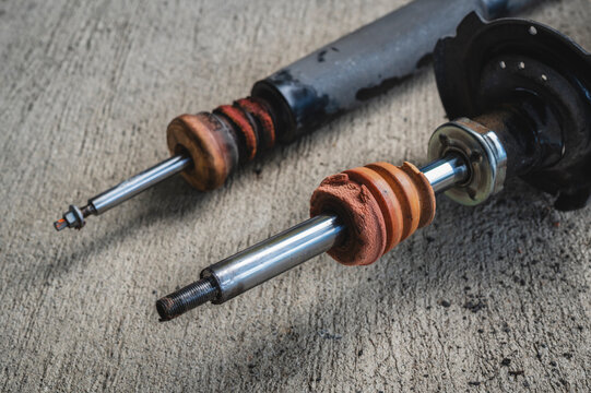 A worn or damaged rubber bump stops fails to cushion heavy suspension compression.