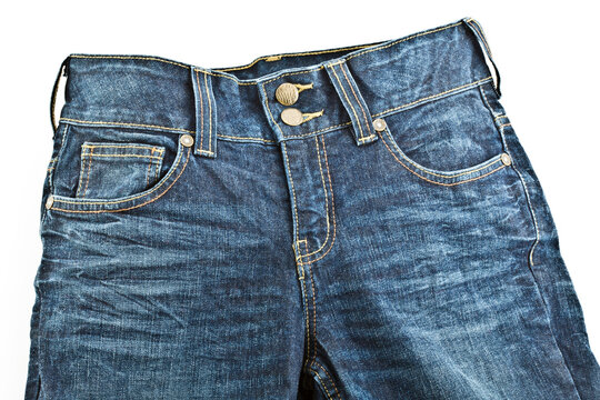 Close up of blue jeans on white background