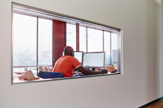 Man using computer in training room