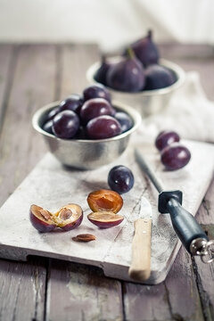 Pitting plums for making jam