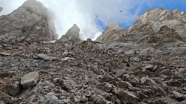 Mytikas Rock Cliffs and Snowfields Beneath Moving Clouds, Mount Olympus Greece