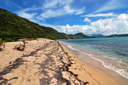 St Kitts and Nevis, Frigate Bay, a beautiful beach against clouds and mountains by side