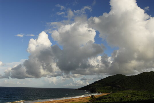 St Kitts and Nevis, Frigate Bay, a beautiful beach against clouds and mountains by side