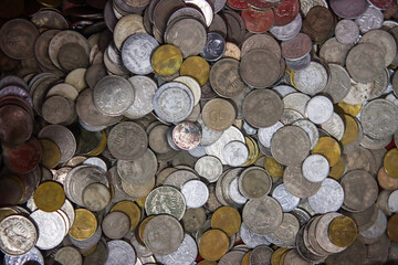 Huge pile of classic indonesian rupiah coins close up © dwiangga