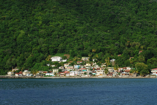 Dominica, Roseau, view of colorful villages south of Roseau on the green hills